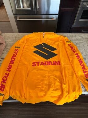 Justin Bieber Yellow & Black Stadium Tour Hoodie with Red Sleeve Graphics